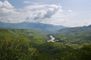The Omo River flows through low lying hills near the Bele Bridge in Ethiopia, on May 18, 2010. 