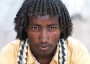 Portrait of an Afar tribesman with traditional hairstyle, in Assayta, Ethiopia, on March 1, 2016