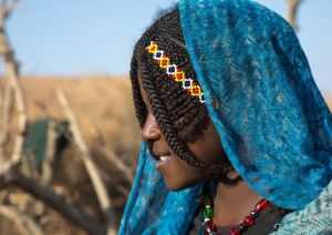 A woman from the Afar tribe with braided hair and a beaded headband in Chifra, Ethiopia, on January 21, 2017